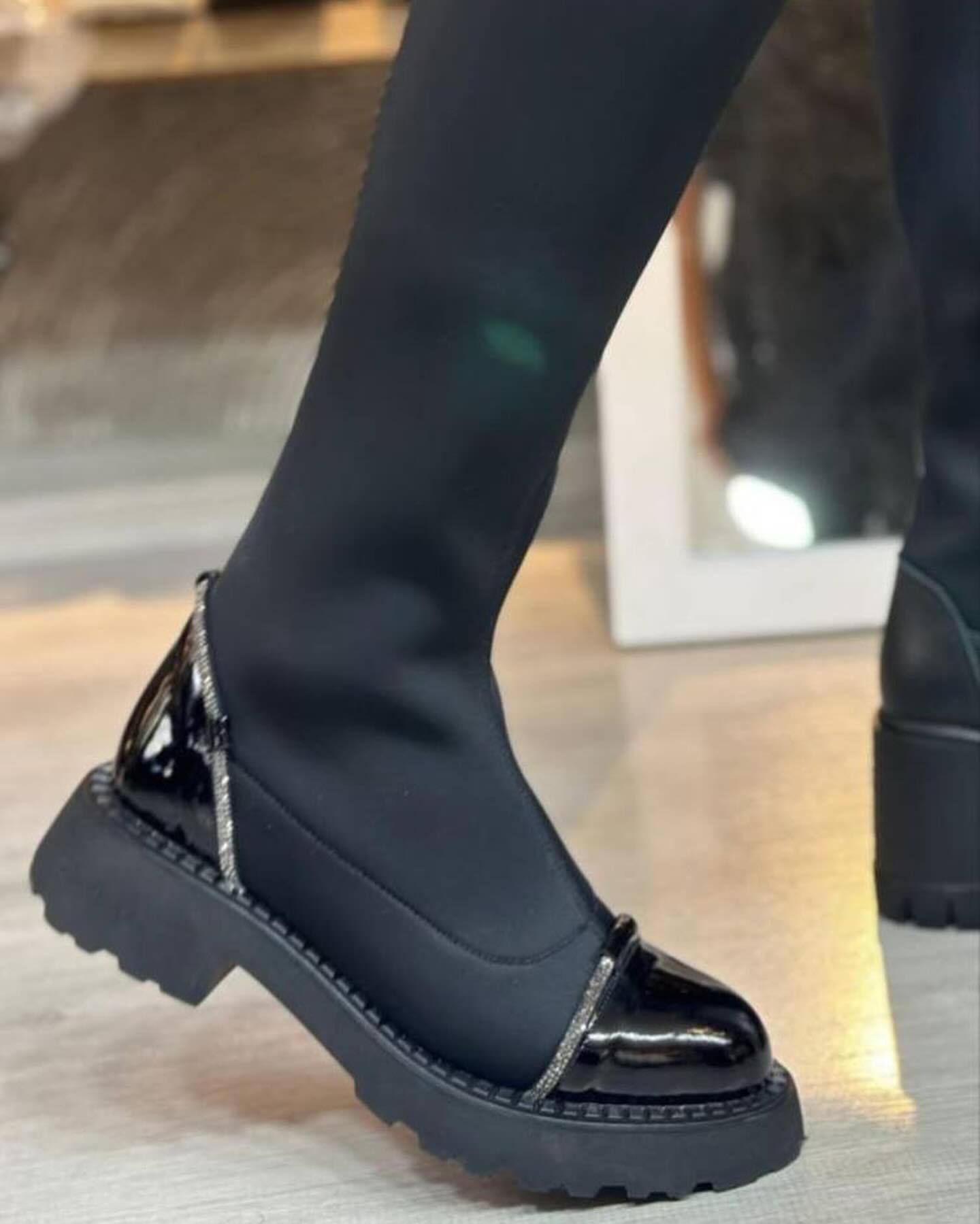 Black stretch high boots