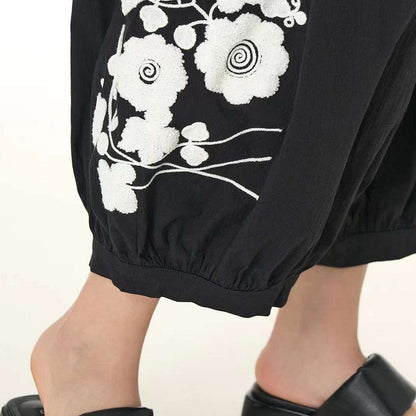 Embroidered elasticated wide-leg pants