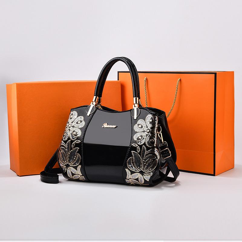 Large capacity embroidered handbag
