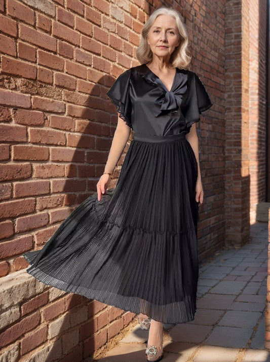 Spun pleated dress