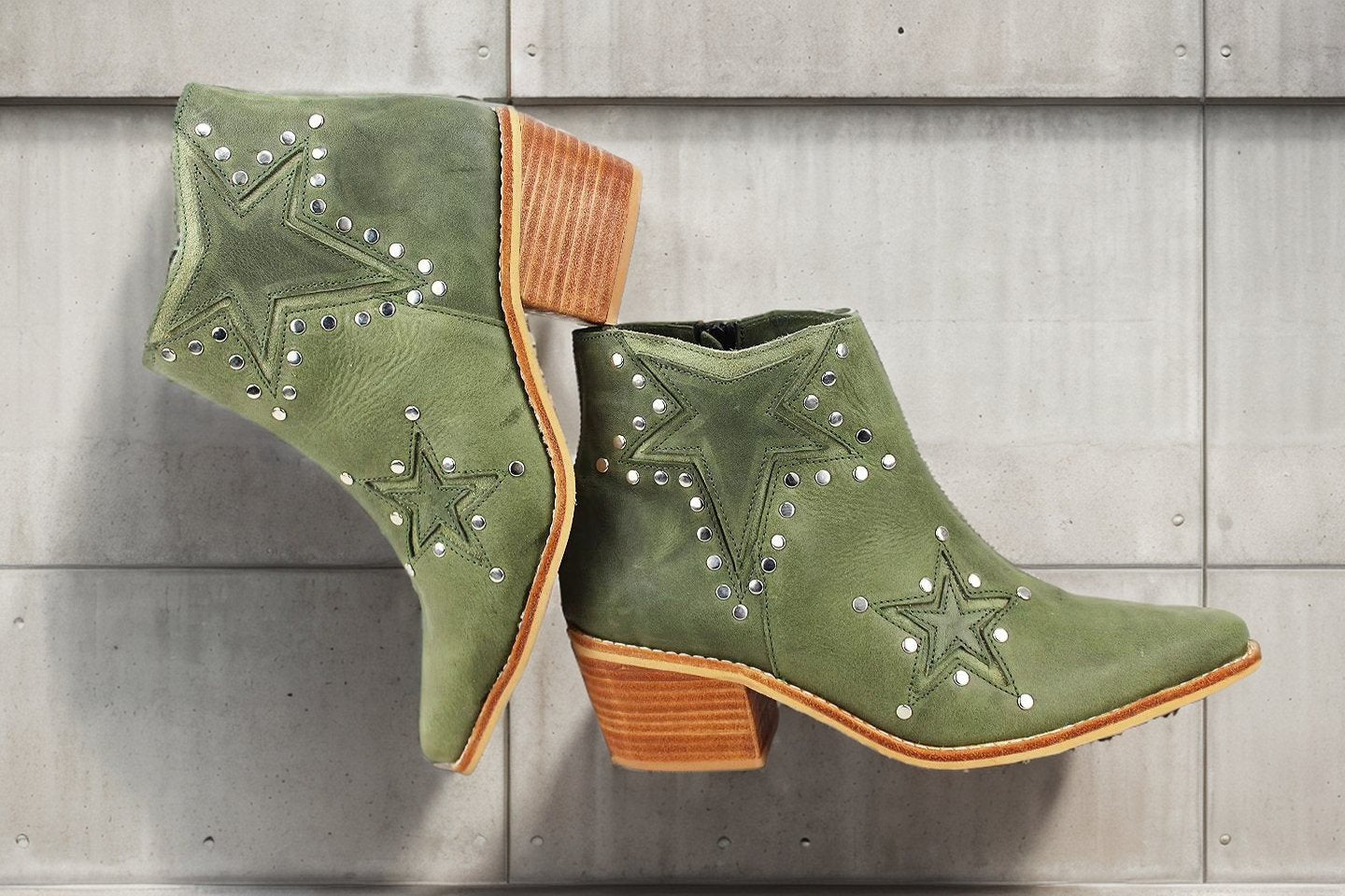 Fashionable leather ankle boots with star rivets Martin boots